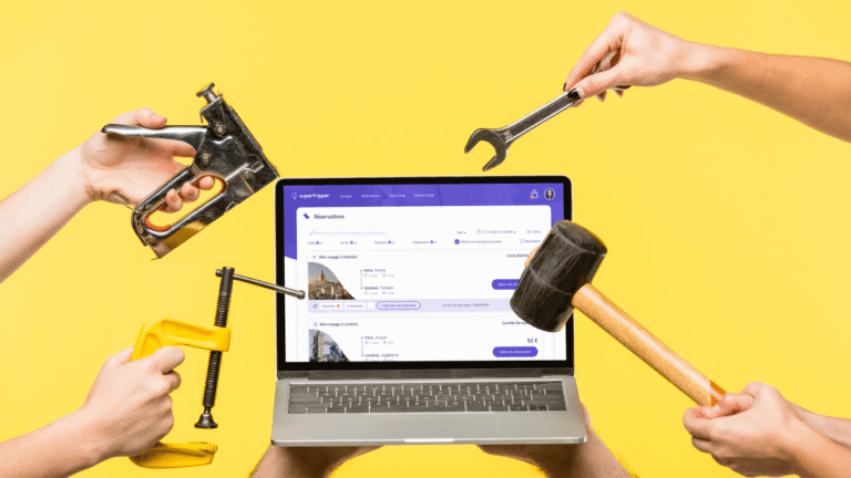 Ordinateur affichant une interface de réservation professionnelle entouré d’outils de bricolage, symbolisant les outils digitaux essentiels pour améliorer la productivité des office managers.